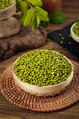 Fresh Green Mung Beans in Wooden Bowl on Rustic Wooden Table with Natural Kitchen Setting