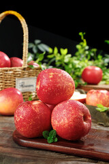 Fresh Red Fuji Apples with Water Droplets on Rustic Wooden Board - Healthy Organic Fruit Harvest