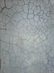 Cement wall texture with visible cracks