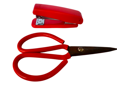 Red stapler and scissors office supplies for everyday use