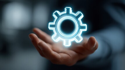 Hand Holding Glowing Gear Symbol Representing Technology, Innovation, and Digital Transformation Concepts in a Modern Business Setting