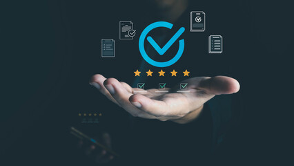 A businessman's hand holds digital icons for quality assurance, including a checkmark, stars, and documents, symbolizing high standards and customer satisfaction in a business process.