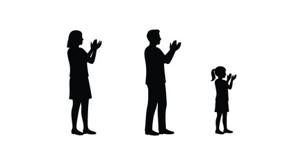silhouettes of people clapping hands together in unity