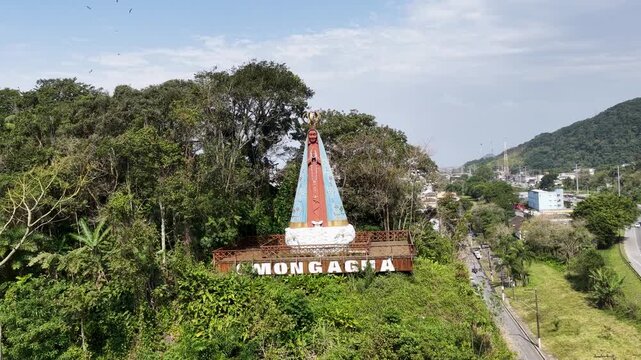 Religious Symbol Of Mongagua In Sao Paulo Brazil. Religious Skyline. Downtown Cityscape. Our Lady Of Aparecida Saint. Religious Symbol At Mongagua In Sao Paulo Brazil. Patron Saint Hill.