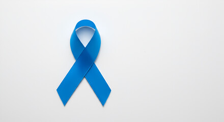 A single blue awareness ribbon is displayed on a white background, symbolizing world diabetes day.