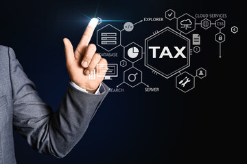 Young businessman pointing at something on black background, closeup