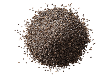 Close-up of dark, small seeds.  A mound of tiny, dark-gray seeds, densely packed in a circular shape.  Scattered seeds surround the central mound