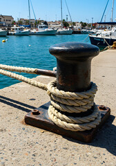 Fototapeta premium Boat Mooring Bollard at Marina with Rope