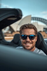 Man in Convertible with Sydney Opera House