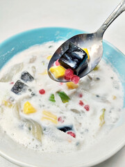 A Delicious Sweet and Creamy Es Teler in a Spoon