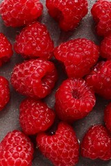 Fresh Raspberries on Gray Surface. Close-up Detailed Texture, Healthy Eating Concept, Red Fruit.