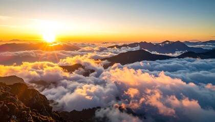 Sunrise over mountain clouds