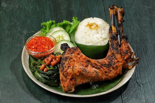Ayam Bakar Taliwang is a spicy grilled chicken dish typical of Taliwang, Lombok, West Nusa Tenggara (NTB) which is made from young free-range chicken which is grilled and coated with a special spice-r
