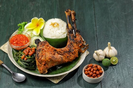 Ayam Bakar Taliwang is a spicy grilled chicken dish typical of Taliwang, Lombok, West Nusa Tenggara (NTB) which is made from young free-range chicken which is grilled and coated with a special spice-r
