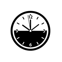 Black and white clock face with hands indicating time