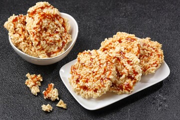 Rengginang Madu. Honey rengginang with Javanese sugar and honey topping is very delicious and crunchy.