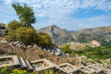 Wooden steps on the slope and mountain view from the ancient city of Sagalassos in Aglasun district of Burdur province in Turkey.