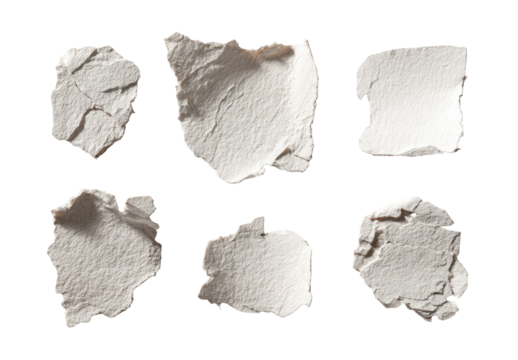 Seven irregular, textured paper pieces - Powered by Adobe
