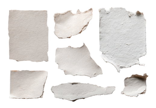 Assorted torn paper pieces, light beige/cream color