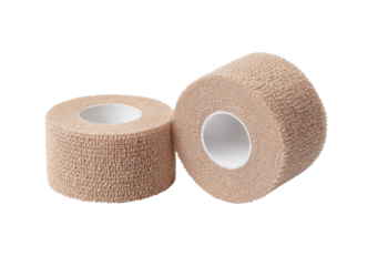 Two rolls of beige athletic tape, wound tightly around a central core.  The tape is textured and shows a slightly rough surface.  The core is a light off-white color