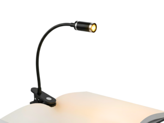 Flexible clip-on LED book light for reading in the dark on a transparent background