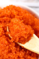 Fresh Orange Flying Fish Roe Tobiko in Bowl - Japanese Cuisine Delicacy for Sushi and Asian Food