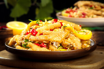 Spicy Chicken Feet with Lemon and Peppers - Traditional Asian Dim Sum Appetizer Dish