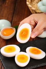 Fresh Hard-Boiled Eggs with Orange Yolks - Free Range Organic Breakfast Food Ingredients on Rustic Wooden Table