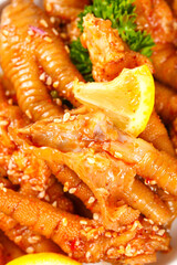 Spicy Glazed Chicken Feet with Hot Peppers and Sesame Seeds - Traditional Asian Phoenix Claw Dish