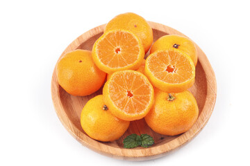 Fresh Mandarin Oranges and Tangerines in Wooden Bowl with Mint Garnish