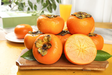 Fresh Fuping Persimmons from Shanxi China on Wooden Board - Sweet Crisp Asian Fruit Display
