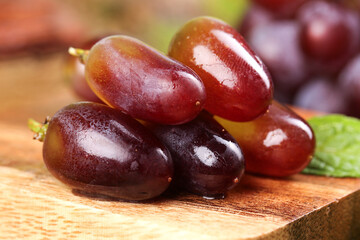 Fresh Red Grapes with Water Droplets on Wooden Board - Healthy Fruit Photography