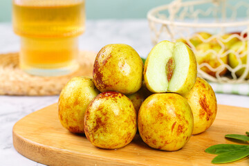 Fresh Jujube Dates on Wooden Board with Tea - Healthy Winter Fruit Snack