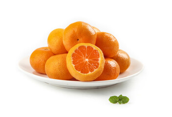Fresh Small Sweet Tangerines from Sihui Guangxi China on White Plate with Mint Garnish