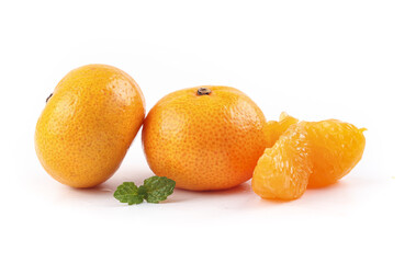 Fresh Guangxi Tangerines with Peeled Segments and Mint Leaves on White Background