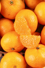 Fresh Ripe Oranges with Peeled Segments - Healthy Citrus Fruit Background