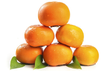 Fresh Shanxi Persimmons Stacked on White Background - Sweet Crisp Chinese Fruit with Green Leaves
