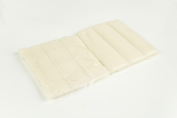 White Rice Cakes in Clear Plastic Packaging Ready for Cooking or Snacking