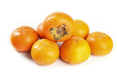 Fresh Ripe Persimmons on White Background - Healthy Orange Autumn Fruit