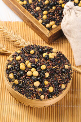 Five grain cereals with soybean mix in wooden bowls making healthy organic food ingredients for northeast farmhouse cooking
