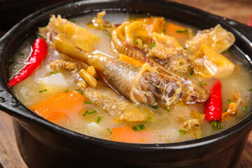 Hubei Specialty Chicken Soup with Air-Dried Ingredients and Vegetables in Black Bowl - Traditional Chinese Cuisine