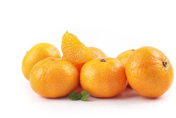 Fresh Small Sweet Oranges from Guangxi China on White Background with Mint Leaf