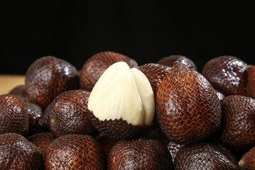 Fresh Snake Fruit with Scaly Skin - Exotic Yunnan Tropical Fruit Peeled Showing White Flesh