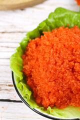 Orange Fish Roe Caviar in Bowl with Lettuce Asian Cuisine Ingredient