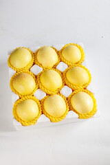 Fresh Yellow Apples in Protective Foam Packaging for Safe Transport and Storage