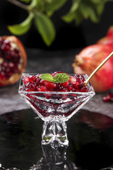 Fresh Pomegranate Seeds in Crystal Bowl with Mint Garnish - Healthy Antioxidant Superfood
