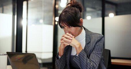 Laptop, stress and thinking with business woman in office for planning, problem solving or...