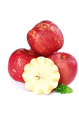 Fresh Red Apples with Star Cross Section and Mint Leaf on White Background