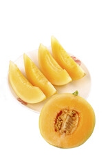 Fresh Yellow Honeydew Melon Slices from Gansu Minqin Region on White Plate Isolated Background