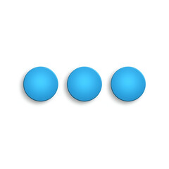 Set of three identical circular buttons with a smooth surface.